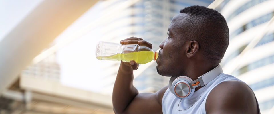 Man drinking sports drink