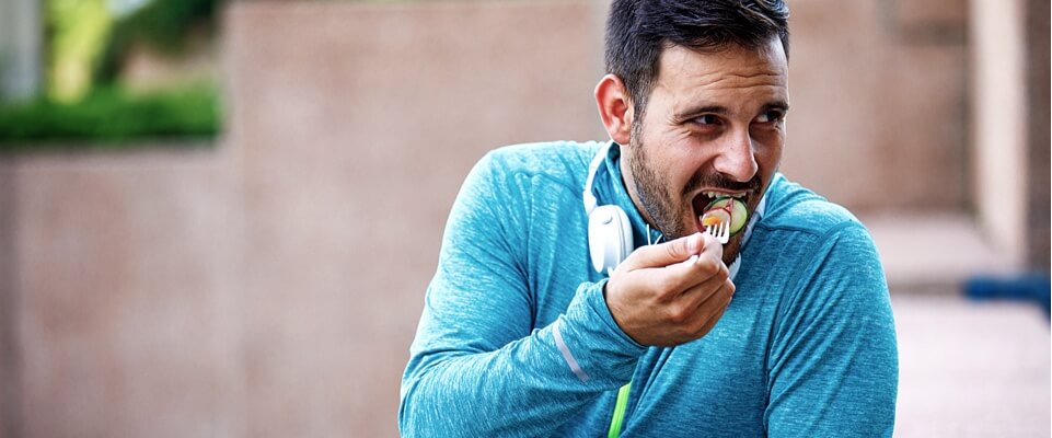 Man eating healthy food