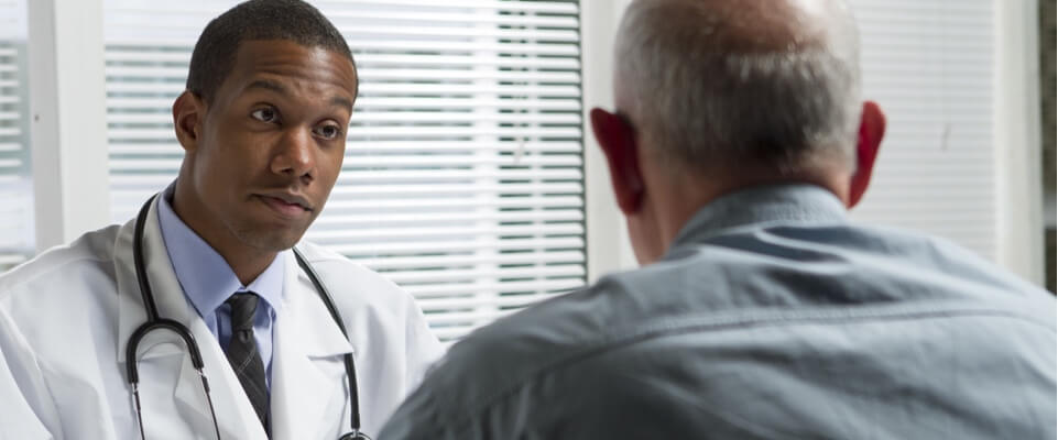 man consulting doctor