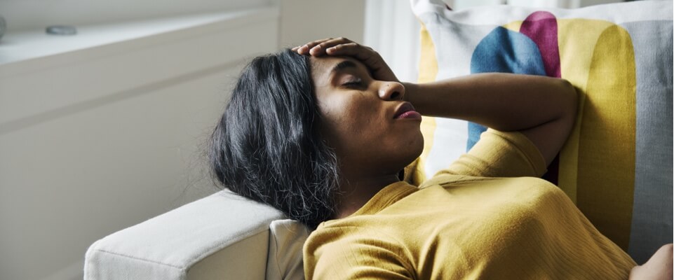 Woman with migraine headache