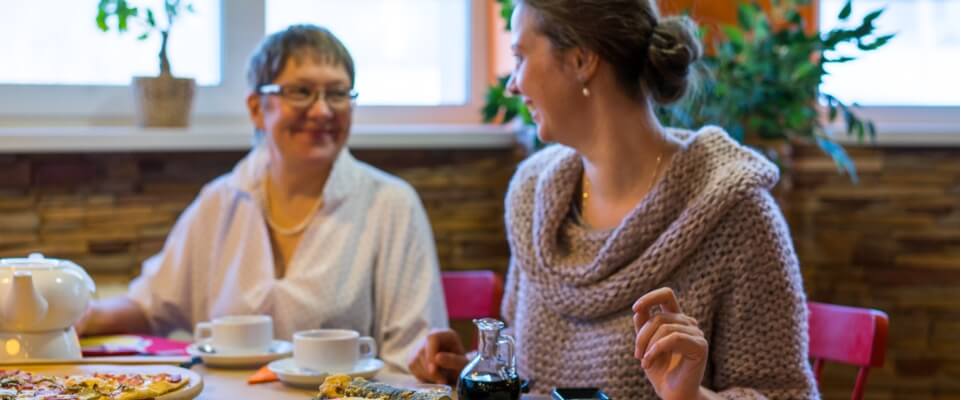older woman eating lunch