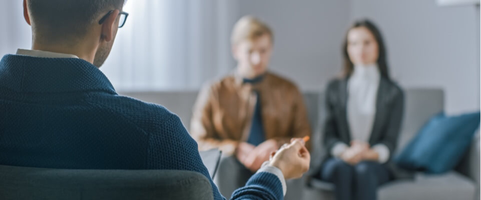 couple in therapy trying to restore relationship
